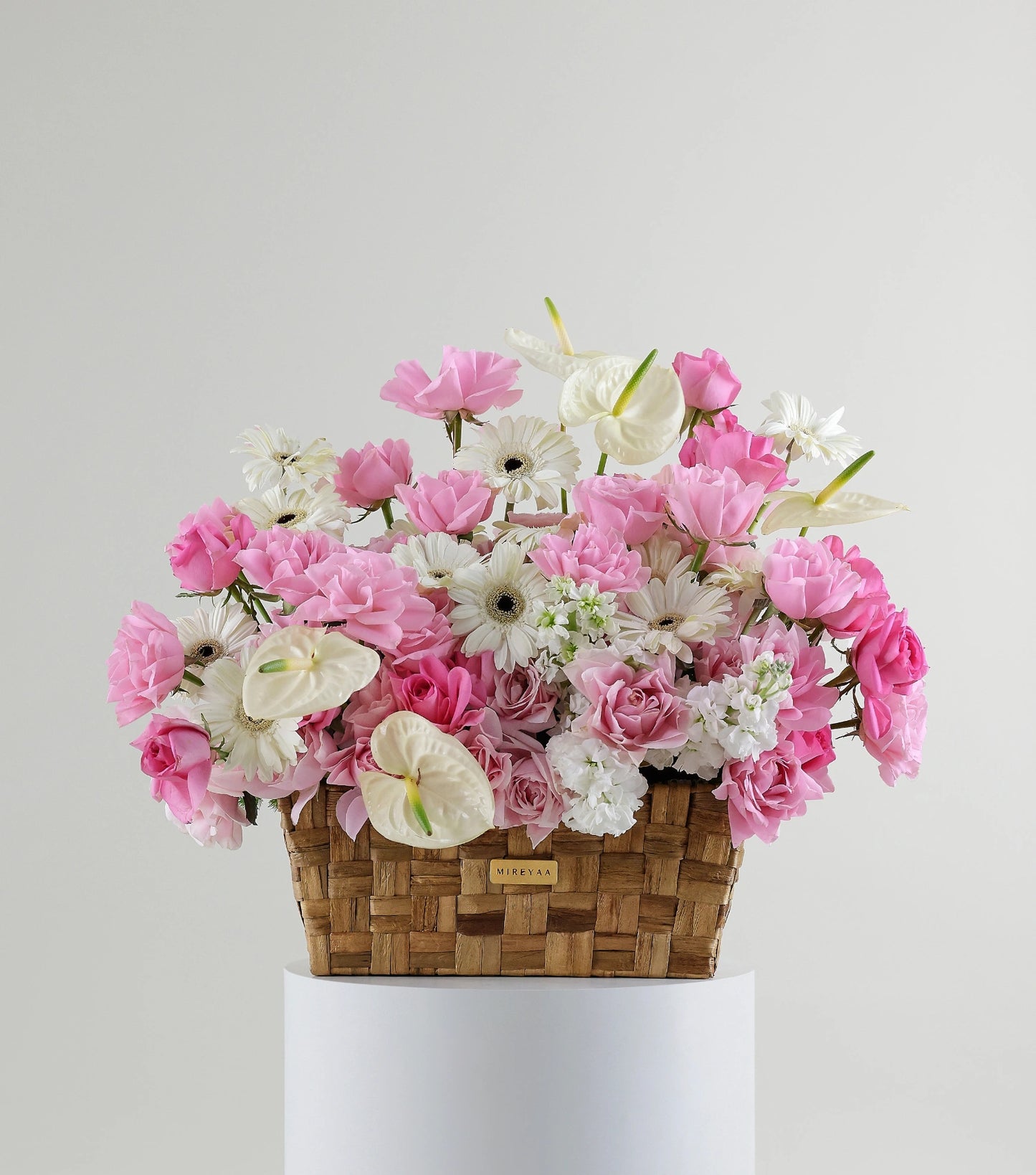 Front view of garden mix flowers in a low rectangular basket — The Blush Garden Rectangular Basket by Mireyaa, Mumbai same-day delivery