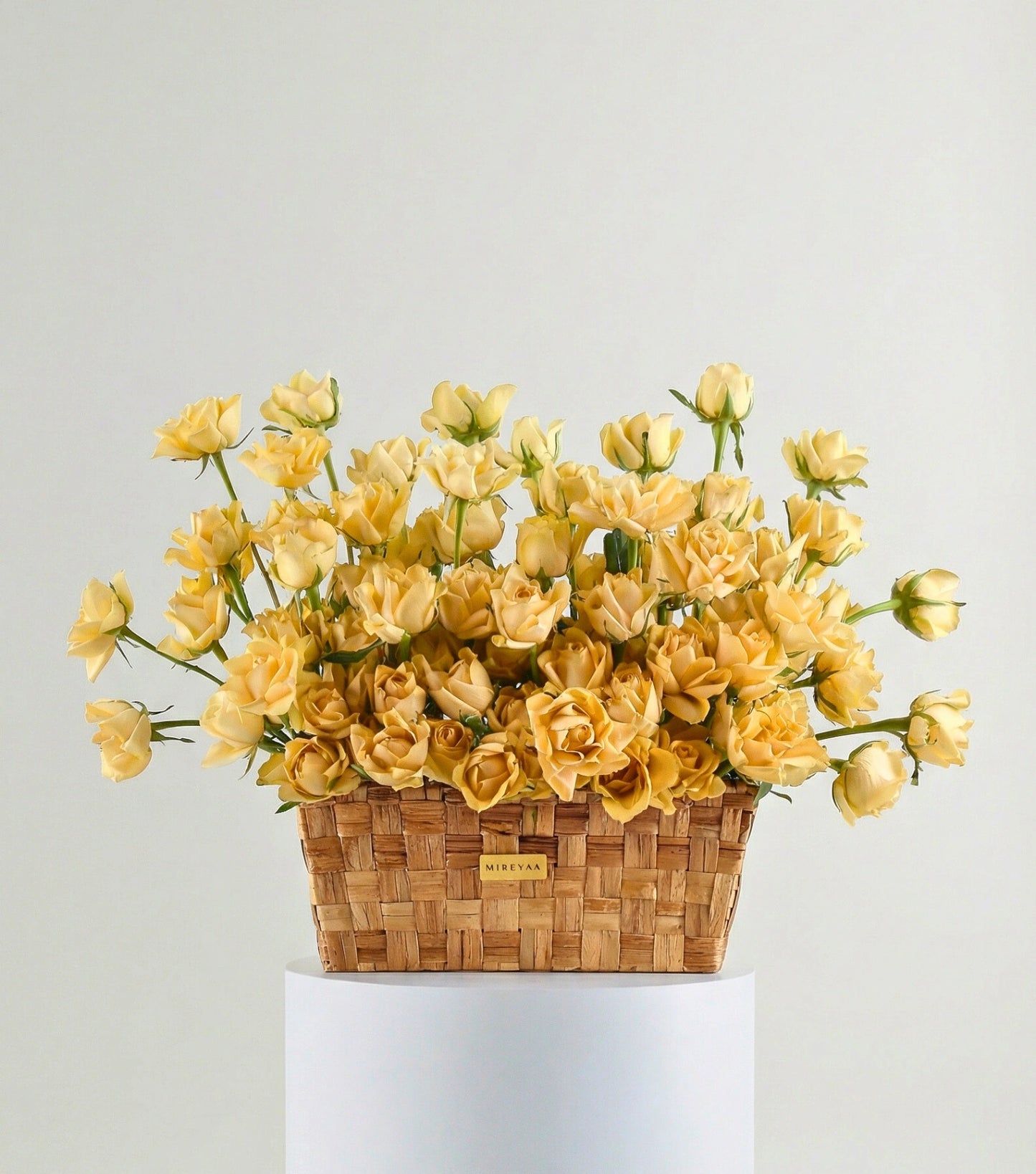 Front view of apricot roses in a low rectangular basket — The Deep Rose Rectangular Basket by Mireyaa, Mumbai same-day delivery