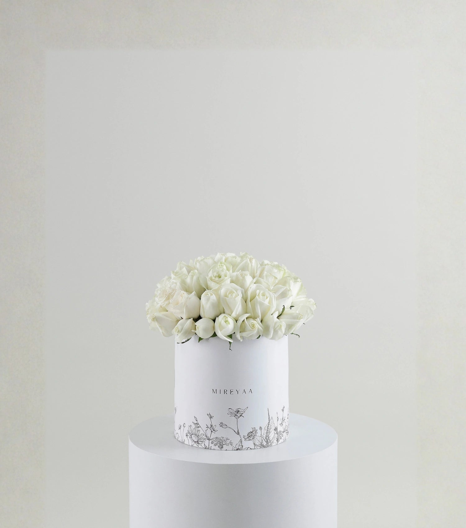 Front view of ivory white roses in a Mireyaa Couture Hat Box — The Ivory Rose Couture Hat Box by Mireyaa, Mumbai same-day delivery