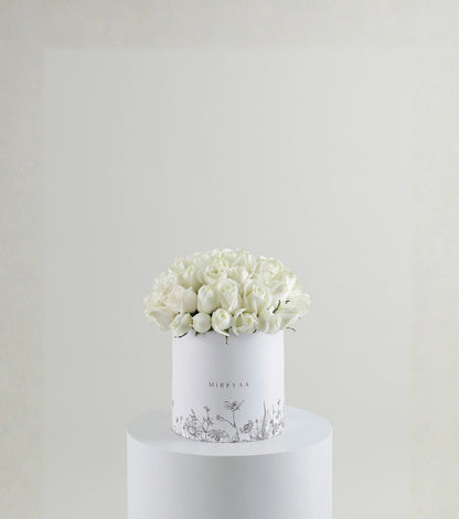 Front view of ivory white roses in a Mireyaa Couture Hat Box — The Ivory Rose Couture Hat Box by Mireyaa, Mumbai same-day delivery