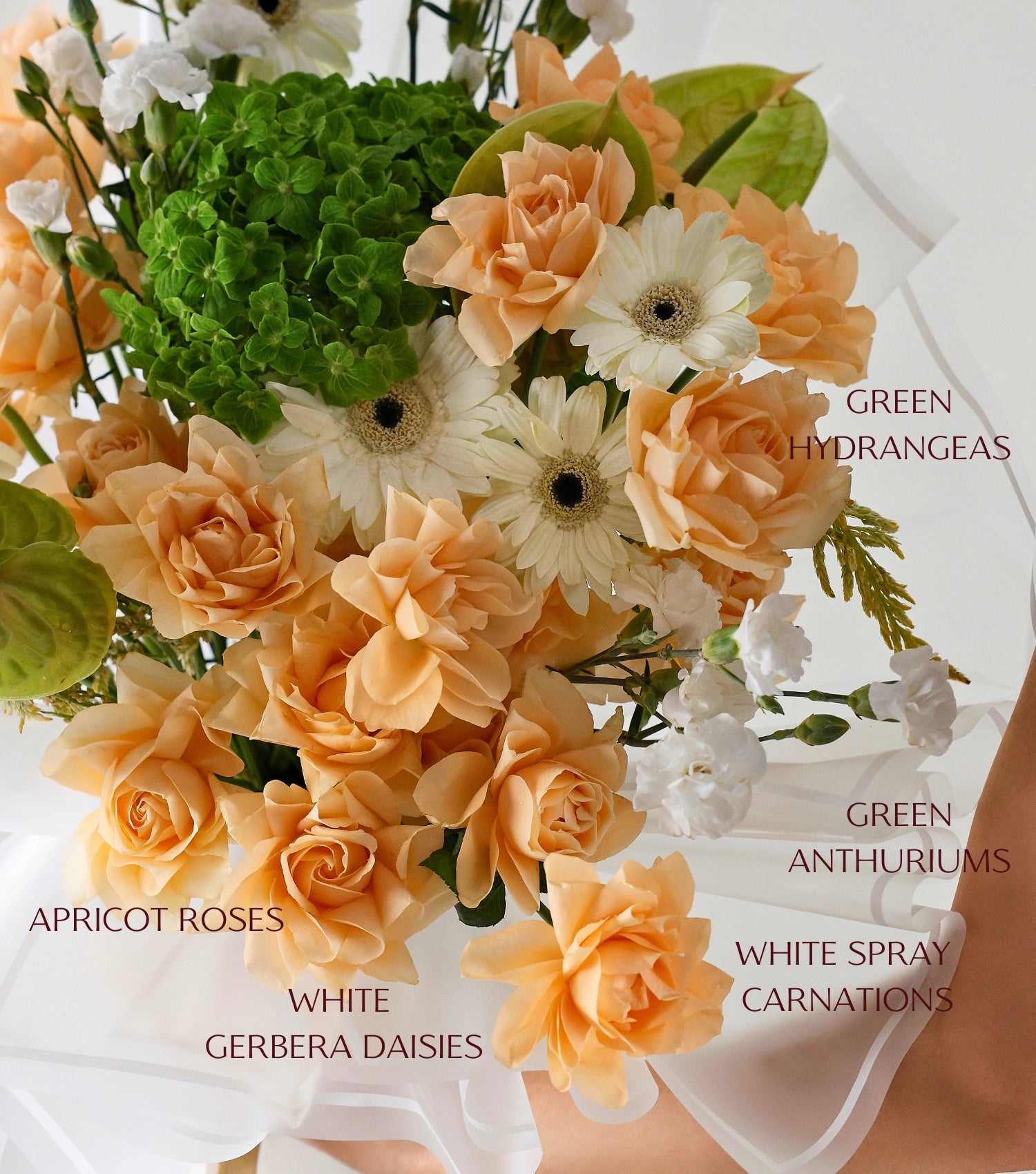 Hero shot of apricot garden mix flowers hand-tied luxury bouquet — The Apricot Garden Bouquet by Mireyaa, Mumbai same-day delivery