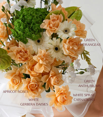 Hero shot of apricot garden mix flowers hand-tied luxury bouquet — The Apricot Garden Bouquet by Mireyaa, Mumbai same-day delivery