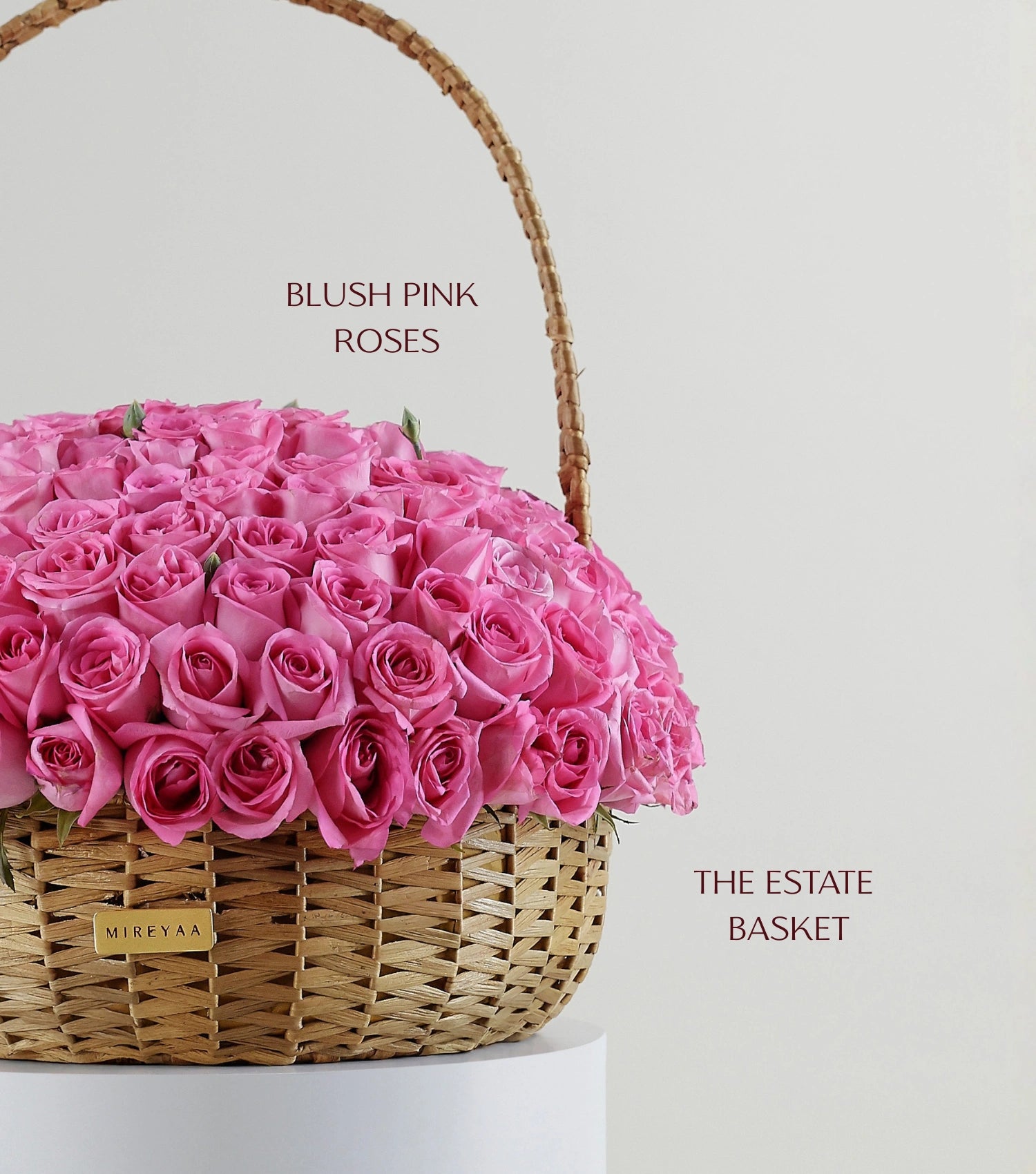 Blush pink rose composition in a water hyacinth estate basket — variant of The Grand Rose Estate Basket by Mireyaa