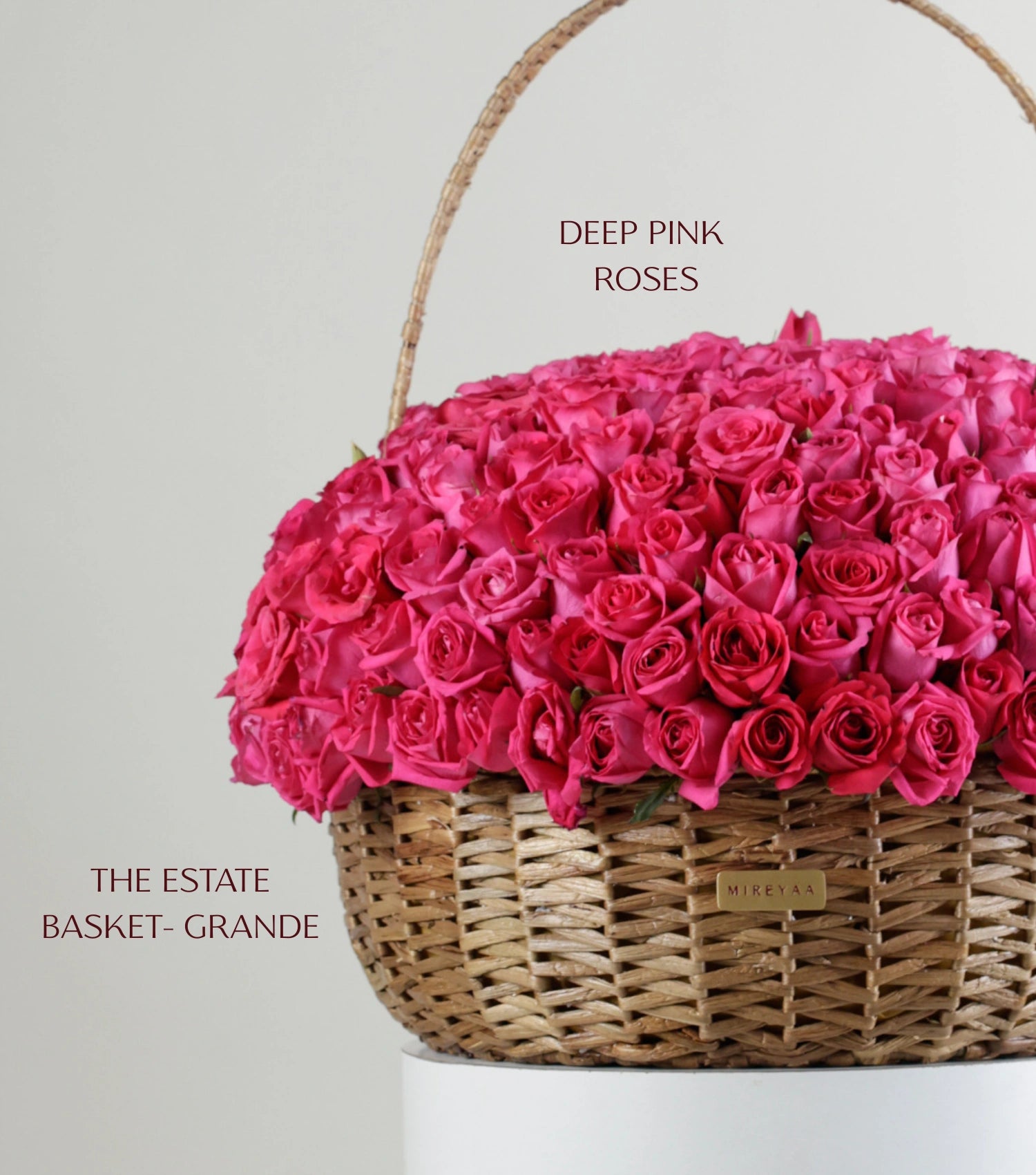 Deep pink Grande size rose arrangement — colour variant of The Grand Rose Estate Basket by Mireyaa