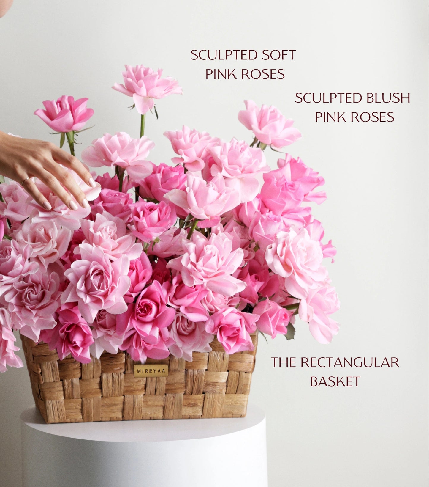 Close-up of blush pink roses in a low rectangular basket — The Sculpted Rose Rectangular Basket by Mireyaa, Mumbai same-day delivery