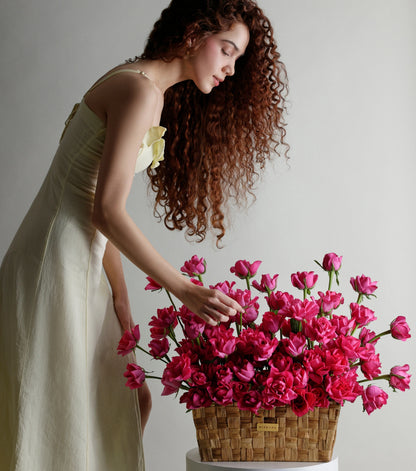 Side view of deep pink roses in a low rectangular basket — The Deep Rose Rectangular Basket by Mireyaa, Mumbai same-day delivery