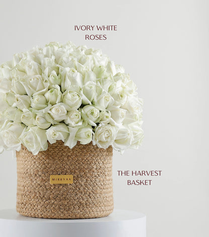 Close-up of ivory white roses in a handwoven jute harvest basket — The Ivory Harvest Basket by Mireyaa, Mumbai same-day delivery