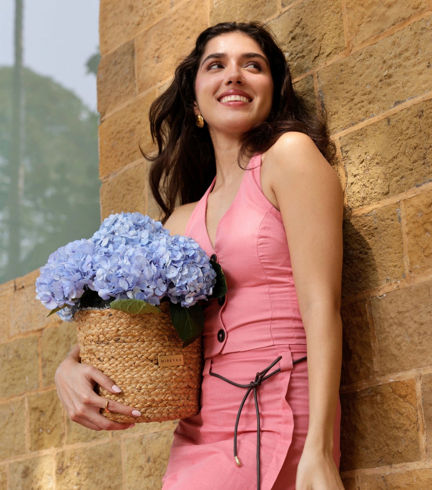 Powder blue hydrangeas arranged as a cloud-like dome in a handwoven jute basket — The Blue Hydrangea Harvest Basket by Mireyaa