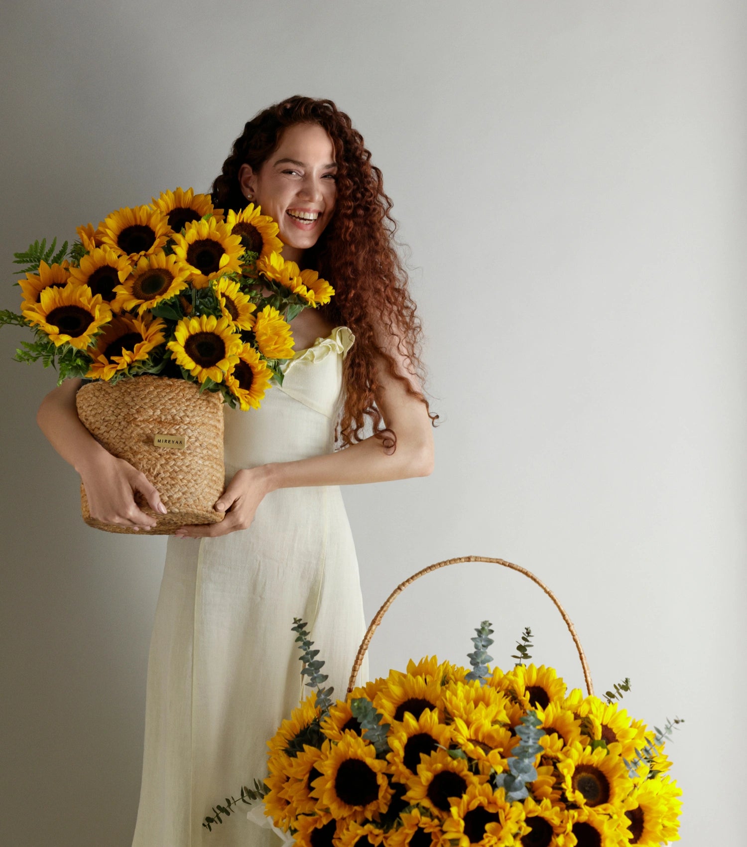 Side view of sunflowers in a handwoven jute harvest basket — The Sunlit Harvest Basket by Mireyaa, Mumbai same-day delivery