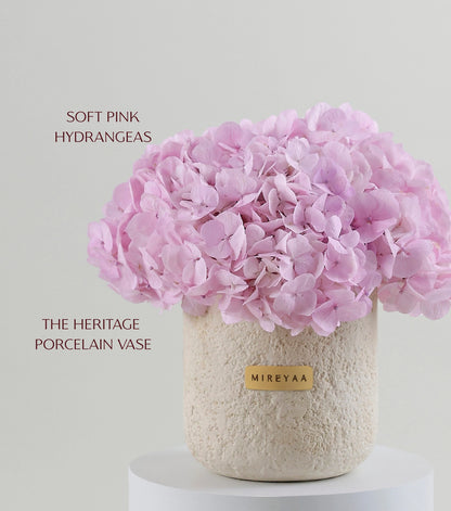 Side view of soft pink hydrangeas in a porcelain dome vessel — The Blush Hydrangea Porcelain Dome by Mireyaa, Mumbai same-day delivery