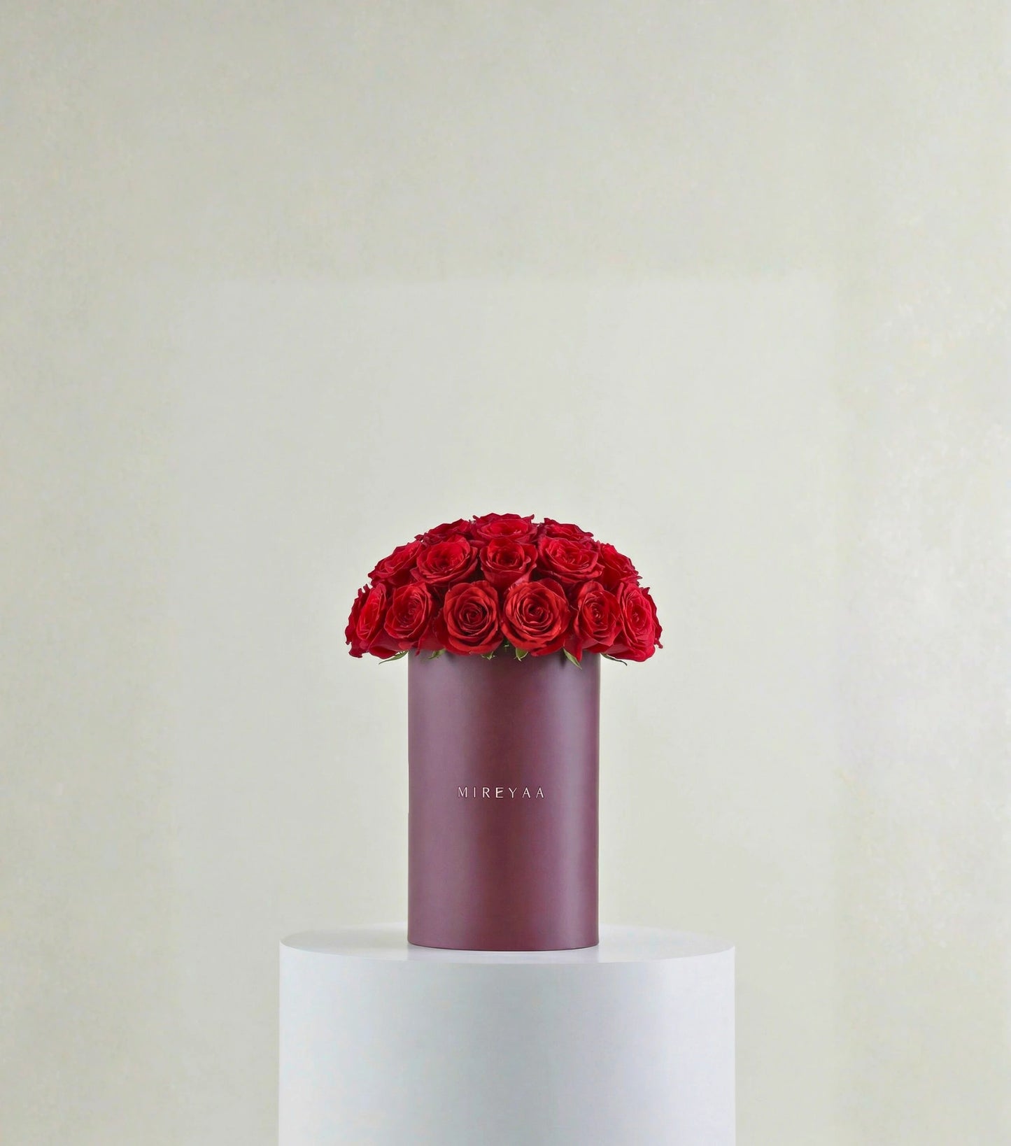 Front view of crimson red roses in a Mireyaa Tall Hat Box — The Soft Rose Tall Hat Box by Mireyaa, Mumbai same-day delivery
