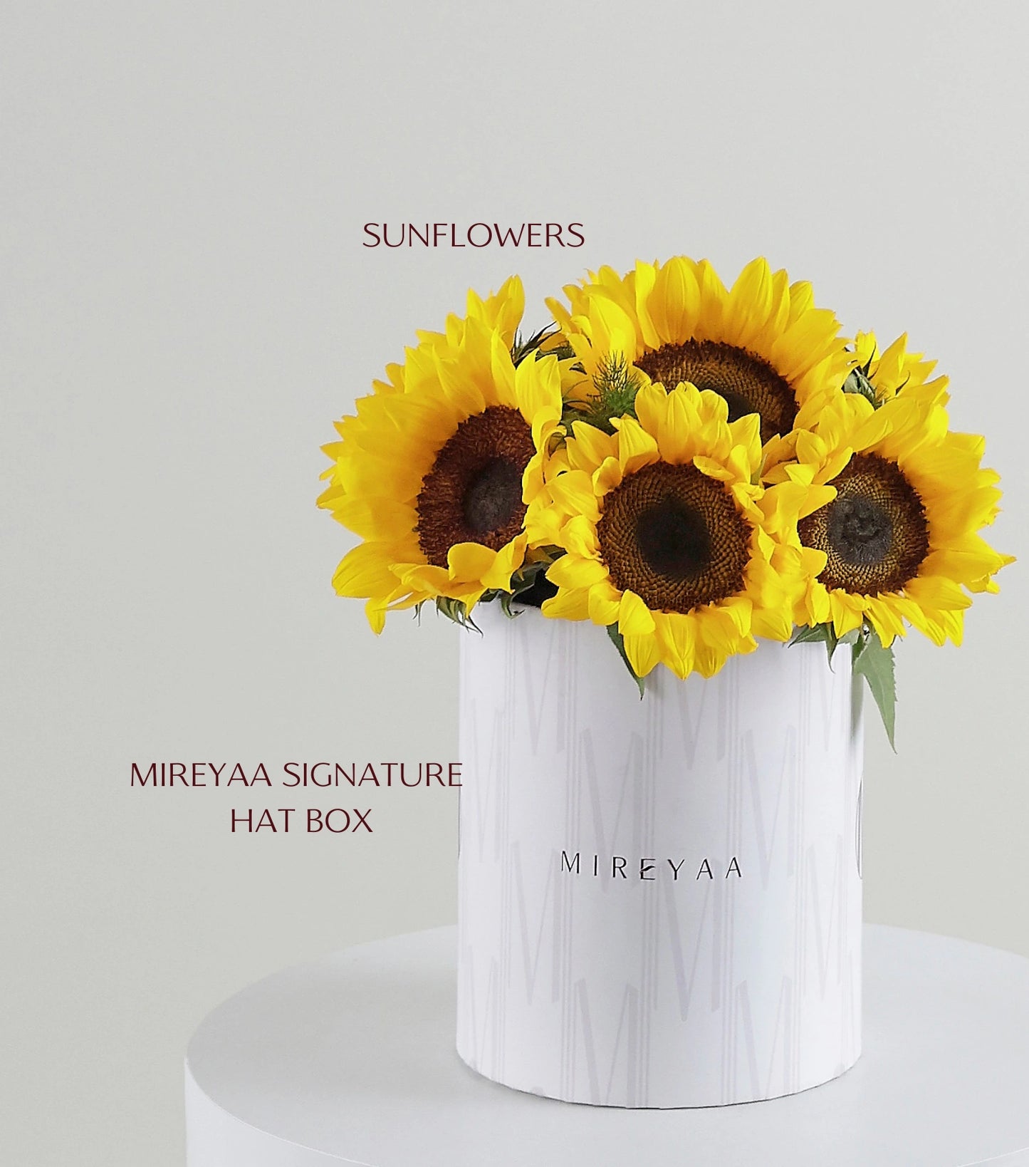 Close-up of sunflowers in a Mireyaa Classic Hat Box — The Sunflower Yellow Classic Hat Box by Mireyaa, Mumbai same-day delivery