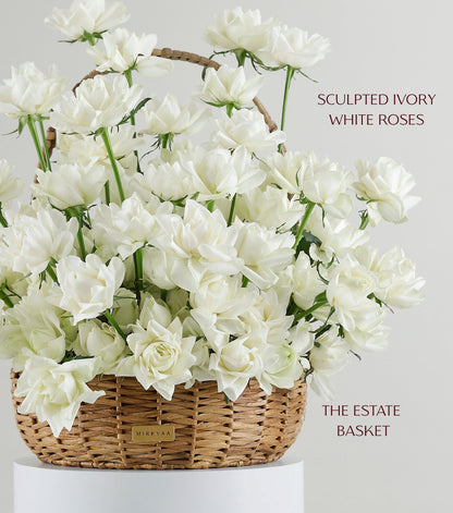 Close-up of ivory white roses in a water hyacinth estate basket — The Sculpted Rose Estate Basket by Mireyaa, Mumbai same-day delivery