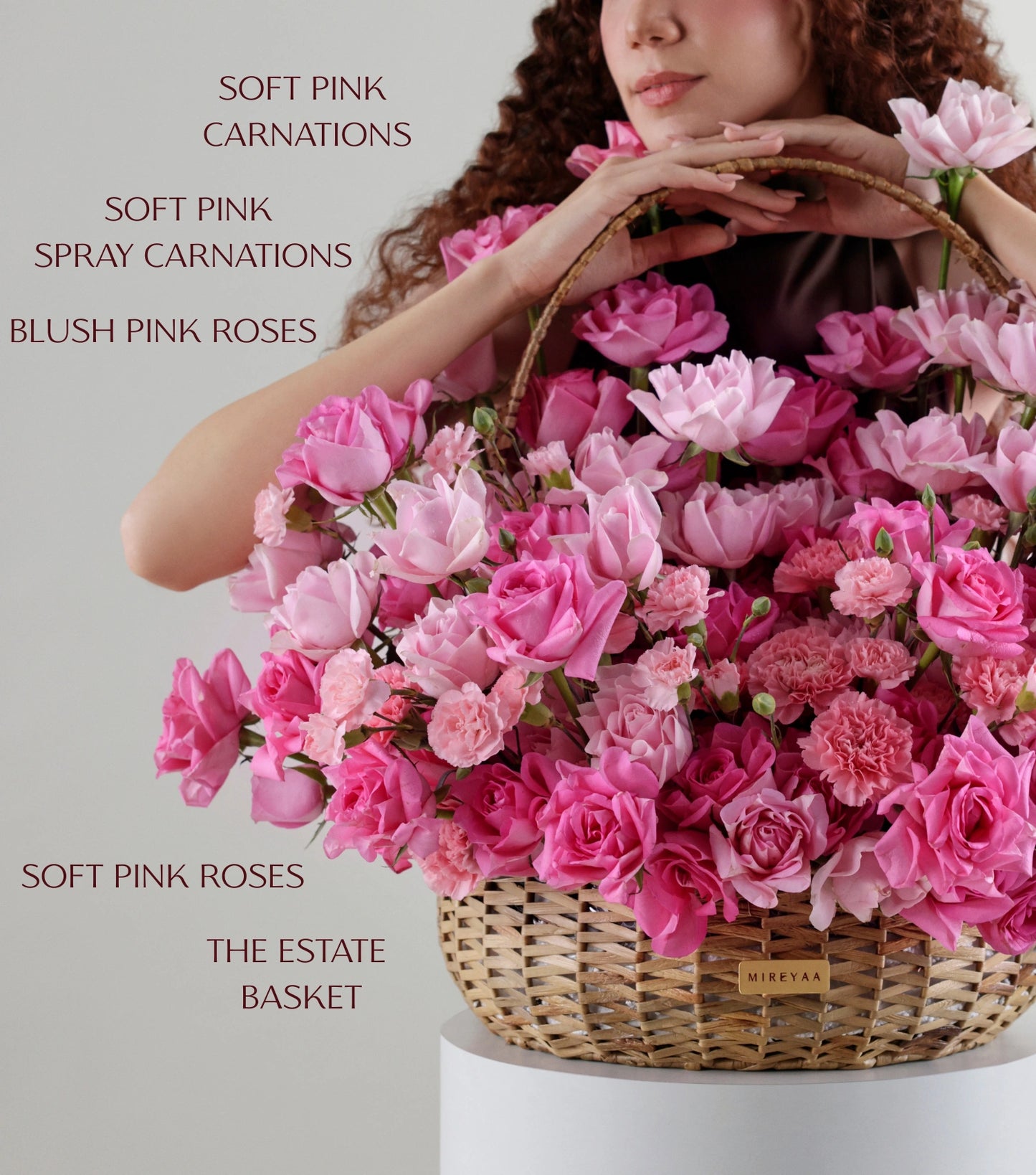 Close-up of blush pink roses in a water hyacinth estate basket — The Petal Study Estate Basket by Mireyaa, Mumbai same-day delivery