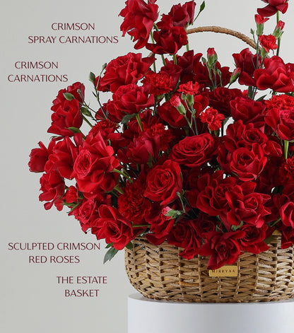 Close-up of crimson red roses in a water hyacinth estate basket — The Crimson Petal Estate Basket by Mireyaa, Mumbai same-day delivery